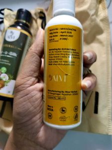 Sunscreen and Hair-O-Silk hair oil