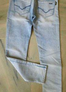 Distressed Light Wash Denim Jeans