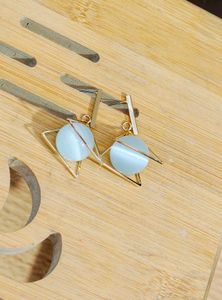 Gold Toned White Pearl Wrapped Pyramid Earings