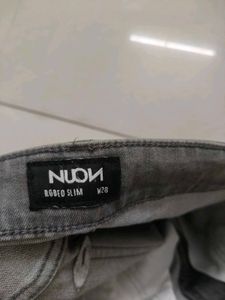 Grey Denim Jeans.     (Size- Waist 28. Length 30)