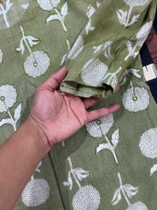 Green kurta.