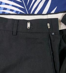 Formal Black Pant,  32 Size Gently Used, No Flaws. Slightly Torn At The Clip As In Pic 4. Very Good Condition.