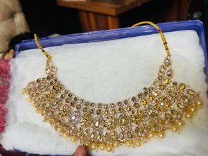 Kundan Set  With Earrings And Tika