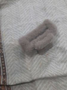 a soft fur hair clutch