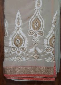 Beautiful Peachy Pink Saree with embroidery