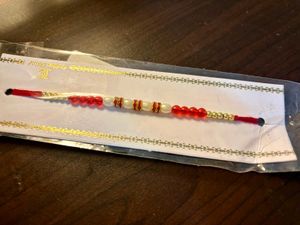 Buy 1 Rakhi Get Kalyan Jewellery 2100 Voucher Free
