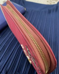 Chic Pink Clutch Wallet with Cute Illustrations