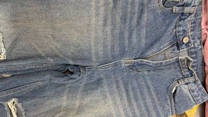 Ripped Knee Jeans