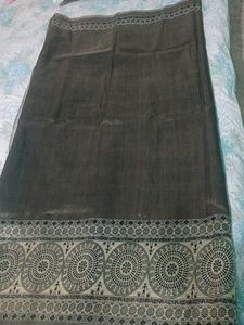 Greyish coloured saree