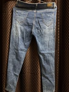 Distressed Denim Jeans