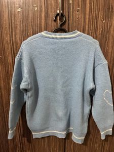 A Blue Skull Sweater.