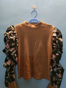 brown puffy sleeves top
