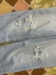 Ripped Light Wash Jeans