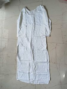 White kurta with little sequin work on it