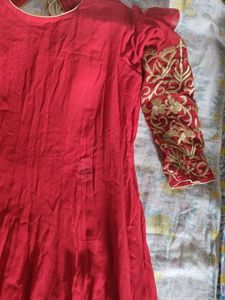 a good conditioned red embroidered gown or frock s