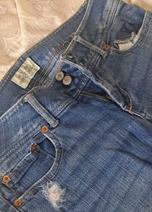 Ripped Denim Capri Shorts