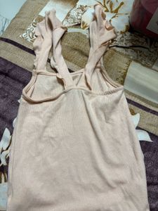 Soft Pink Ribbed Tank Top with Ruffle Straps..