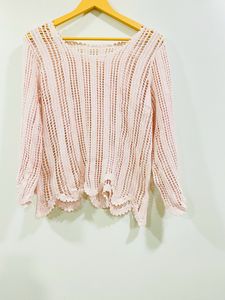 A Beautiful Top With Net Type Of Work On It