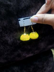 Yellow beaded jhumka earrings