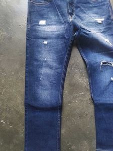 Ripped Blue Denim Jeans