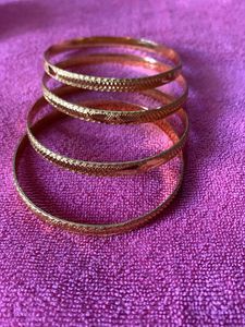 Set of 4 Gold Tone Bangles
