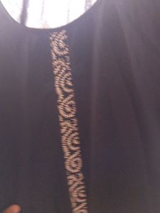 Black Skirt with Embroidered Hem