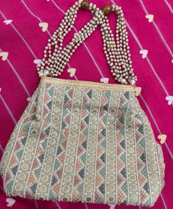 Graceful Ethnic Clutch With Embroidery