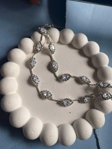 Elegant Silver Necklace With Matching Earrings