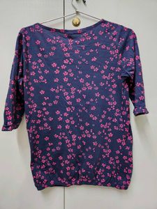 A Navy Blue Shirt With Pink Printed Flowers