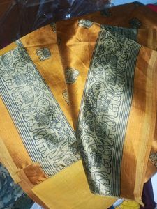 Ethnic Elephant pring yelloish orange saree...