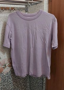 Uniqlo Solid Women Round Purple T Shirt
