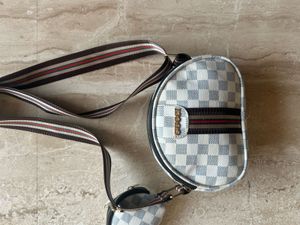 Gucci white sling bag