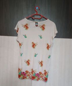 A White Floral Top 🧡