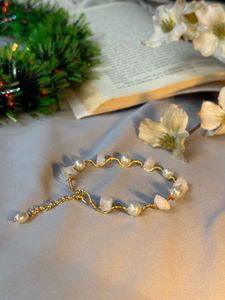 wire wrapped rose quartz and pearl bracelet