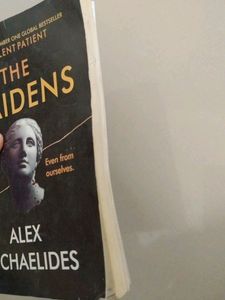 The Maidens by Alex Michaelides And notebook