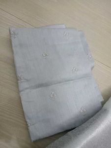 Elegant Sky White Saree Orgenza