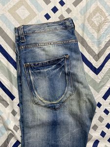 Distressed Denim Jeans