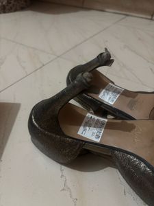Clark’s Metallic T-Strap Heels