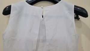 White Sleeveless Top