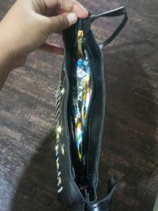 Black Sling And Black Organizer