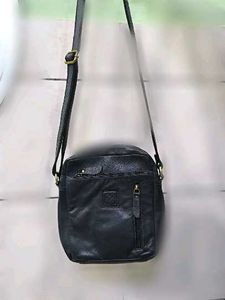 Good condition crossbody blue leather bag.