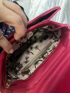 Red Grommet Chain Bag