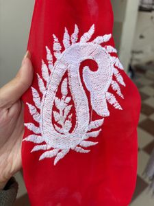 A beautiful red chikankari short kurti