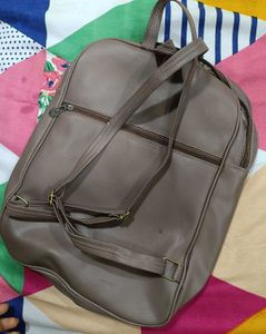 Slightly Used Bagpack With 4 Chain Pockets