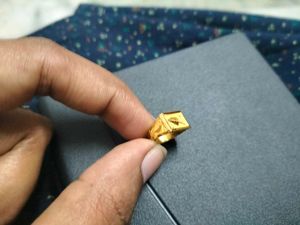 Gold Ring on Scale