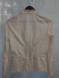 Off White Ruffled Top With Golden Buttons