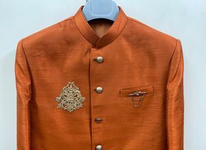Free Jootis with Elegant Orange Sherwani