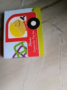 Stacking toys and a puzzle book