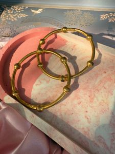 pair of gold bangles
