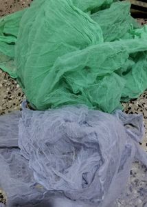 Two Mosquito Nets And One Curtain